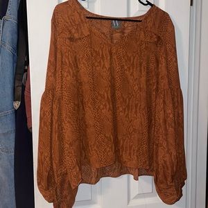 Animal patterned blouse. Never worn!